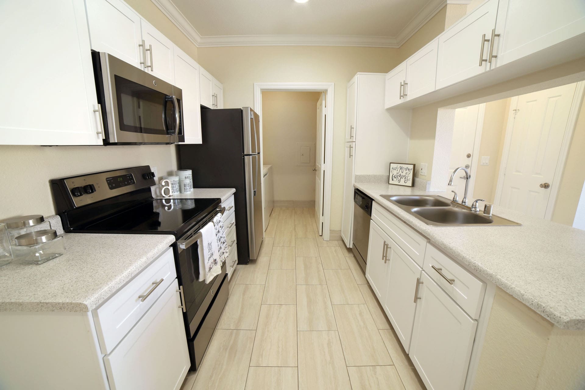 Aliso Viejo Apartments for Rent-Aventine Apartments Kitchen with Matching Appliances, White Cabinets, and Tons of Counter Top Space